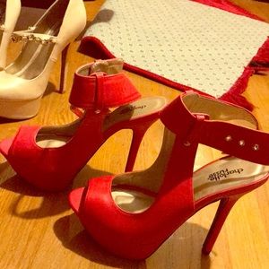 Red platform heels